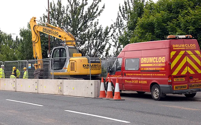 Drumclog Plant excavator and van on a civil engineering site in Glasgow